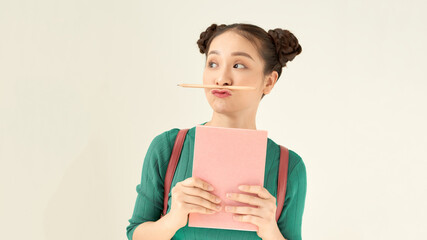 Photo of funny foolish student lady hold journal book not reading playing pen make fake mustache...