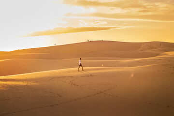 Young man walking in the runes in Gran Canaria in Spain during Covid