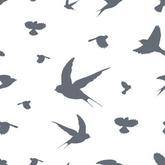 Seamless pattern with flying birds silhouettes. Texture on white and transparent background.