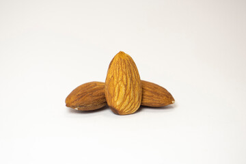 almonds on white isolated background