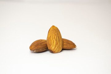 almonds on white isolated background