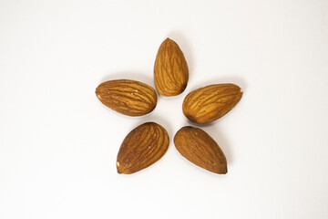 almonds on white isolated background