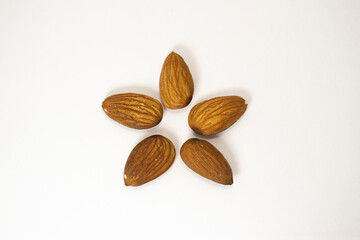 almonds on white isolated background