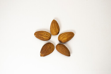 almonds on white isolated background
