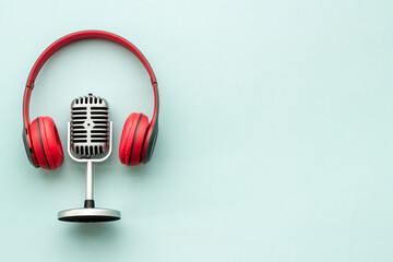 Studio microphone and headphones, top view. Recording podcast and streaming concept