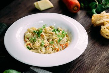 Parmesan pasta in a white plate