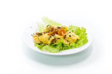 fried omelet with forest mushrooms chanterelles, on white background