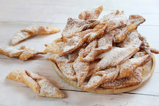 Faworki (angel wings) sprinkled with powdered sugar - traditional Polish carnival delicacy
