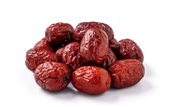 Close up of red dates (jujube) isolated on white background.