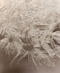Patterns from frost on glass as a background.