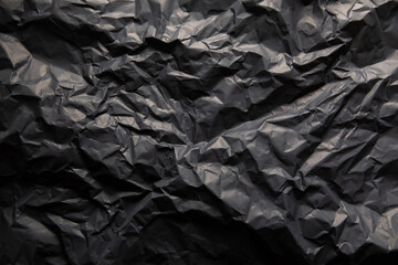 Grunge black paper background and crumpled paper texture, background for copy space