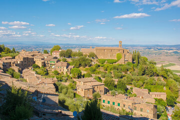 Fototapeta na wymiar Residential buildings in the historic medieval village of Montalcino in Siena province, Tuscany, Italy 