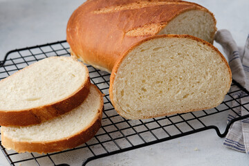 Slice wheat bread on wood background, healthy food concept