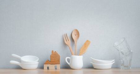 Obraz na płótnie Canvas kitchenware decoration on wooden shelf with copy space