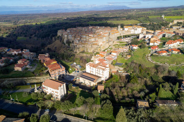 Fototapeta na wymiar Aerial view of Farnese, A village in Viterbo, houses, roads and a landscape 