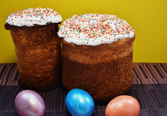 Two Easter homemade Easter cake and three Easter eggs