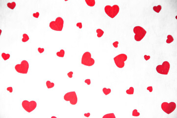 red hearts on white. valentine's day concept. texture with romantic hearts