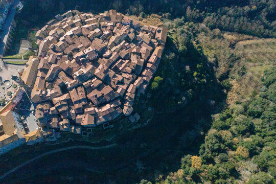 Aerial view of Farnese, A village in Viterbo, houses, roads and a landscape
