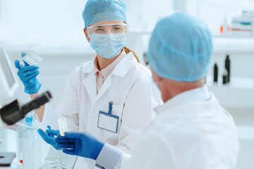 scientists are conducting research on a new drug .