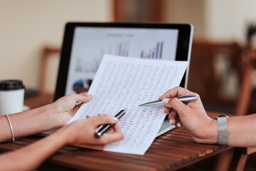 close up. colleagues analyzing General financial information .