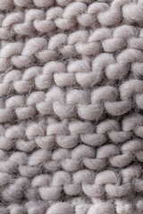 Vertical Texture of soft knitted grey Wool for creative uses.