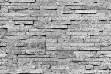 Natural facade stone decoration quartzite background texture. modern granite stone wall
