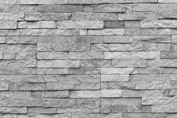 Natural facade stone decoration quartzite background texture. modern granite stone wall