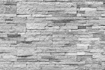 Natural facade stone decoration quartzite background texture. modern granite stone wall
