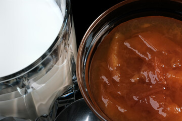 Glass bowl with peach jam