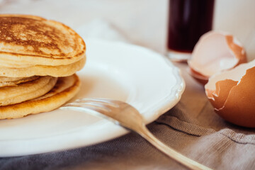 close up of pancakes on plate on table