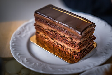 dessert, chocolate cake on a dish in cafe