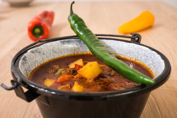 Hungarian Goulash or Gulyas Served in a Small Cauldron
