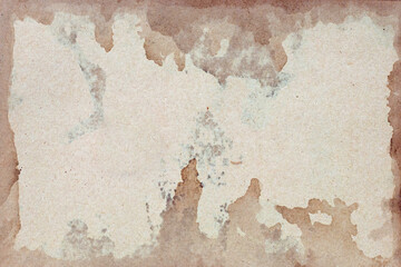 Old brown paper grunge background. Abstract liquid coffee color texture.