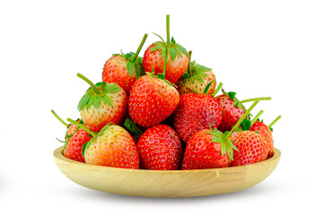 Fresh strawberries in a wooden dish on white background with clipping path