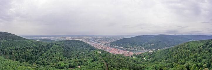 Aerial drone shot of Heidelberg from Konigstuhl hill in overcast summer morning