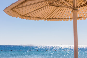 beach umbrellas on the Red Sea beach near Hurghada, Egypt