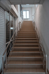 Staircase up the retail space.