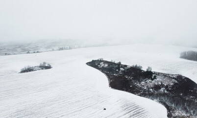 Top view of winter snow agro field