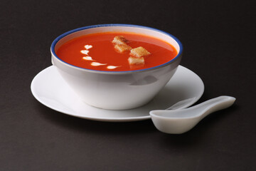 Tomato soup with croutons and fresh cream.
