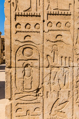 Egyptian hieroglyphs carved in stone. The Karnak Temple Complex, a vast mix of decayed temples,...