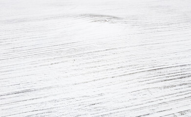 Winter landscape with texture of snowy empty field