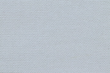 Fototapeta na wymiar The texture of a light knitted sweater fabric. 