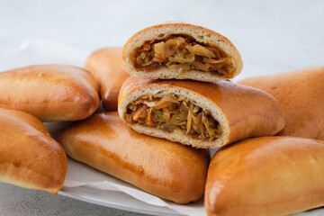 Traditional russian cabbage pies. Copy space. Delicious dinner