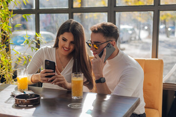Couple hugging and enjoying time together. Lovers spending quality time together on a sunny day.