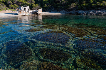 Shipwreck abandoned at a beach of Skyros island in Greece