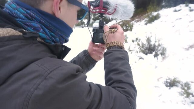 Filmmaker in the winter snow.