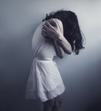 suffering woman, expressing agony and despair