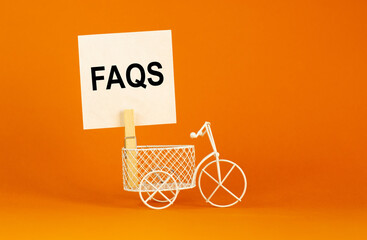 FAQS, frequently asked questions symbol. White paper. Words 'FAQS, frequently asked questions'....