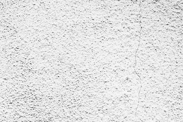 Texture of a concrete wall with cracks and scratches which can be used as a background
