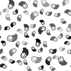 Black Human head with animals footprint icon isolated seamless pattern on white background. Pet paw in heart. Love to the animals. Vector.